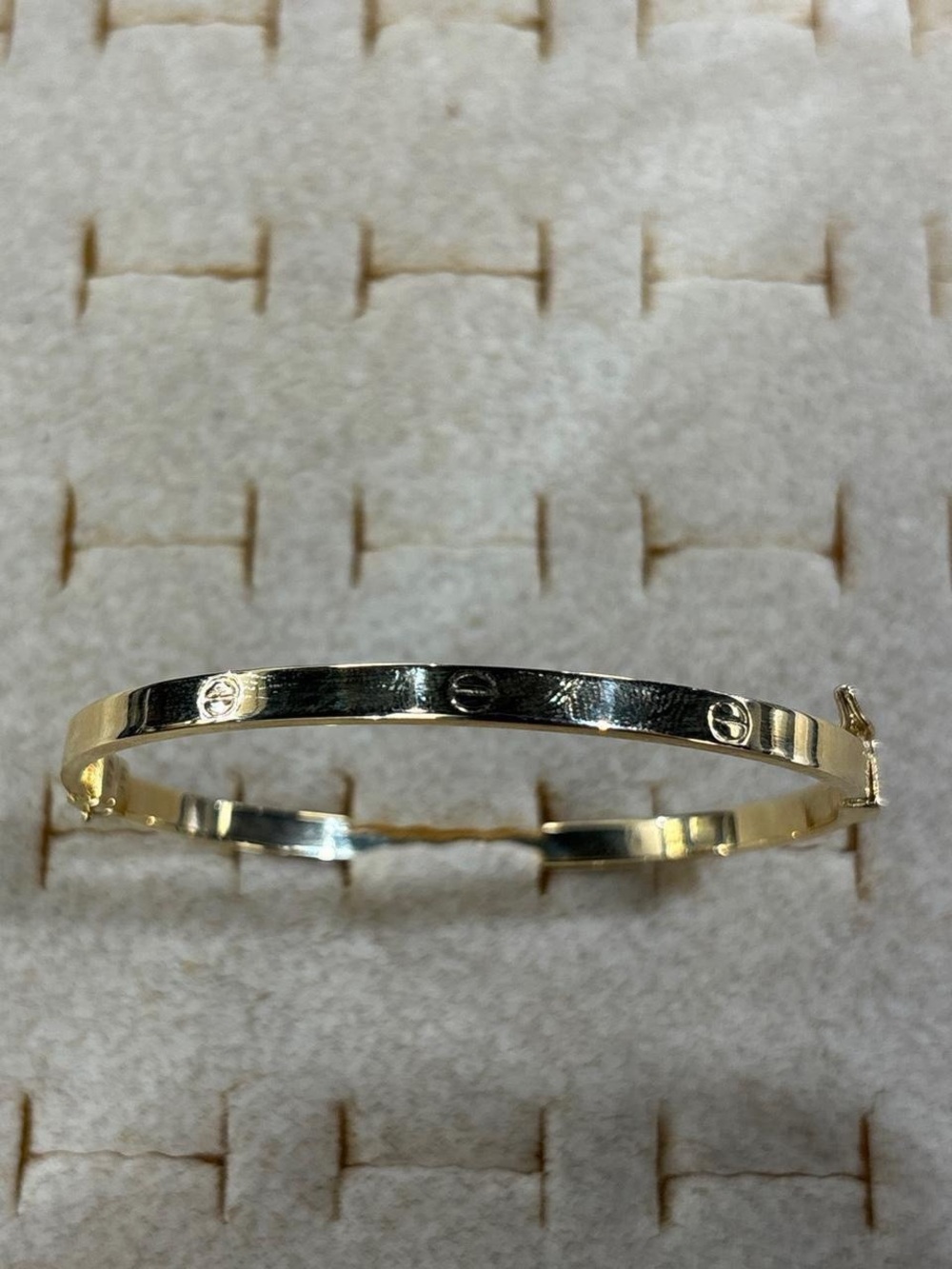 Gold Tone Screw Motif Bangle Bracelet - Women